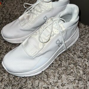 On Running All-White Athletic Shoes